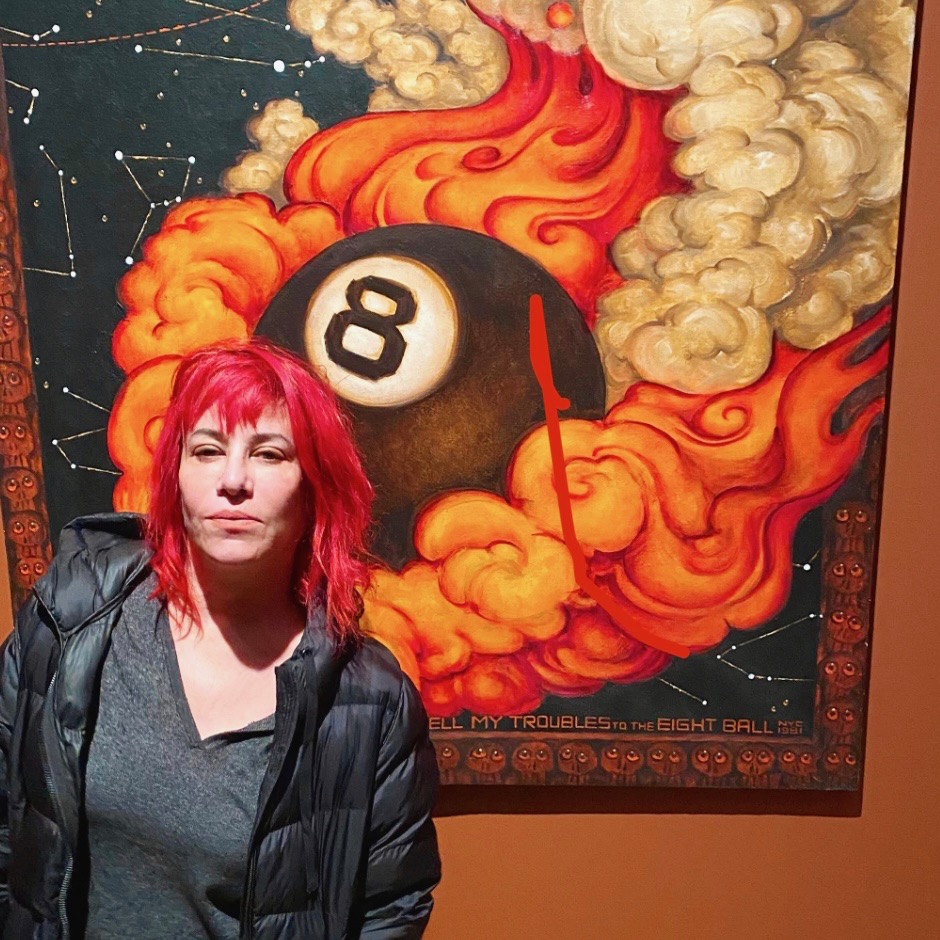 Jennifer Finch in front of Martin Wong "Tell My Troubles To The Eight-Ball"