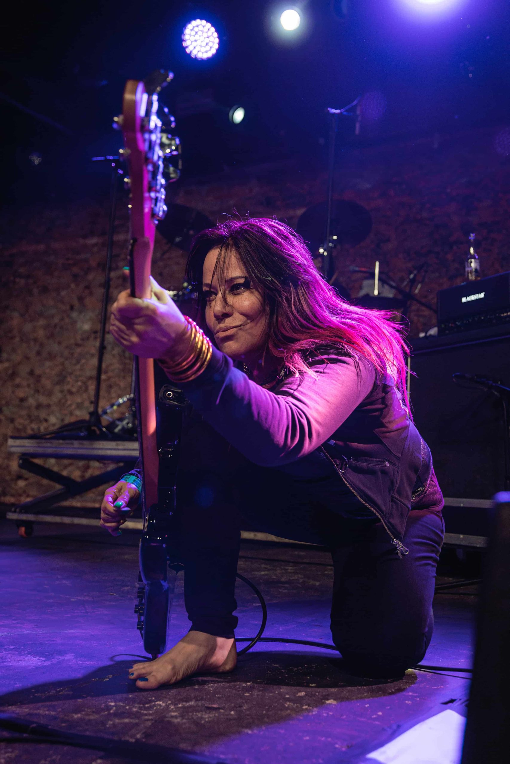 Jennifer Finch performing live on stage in Brazil 2025