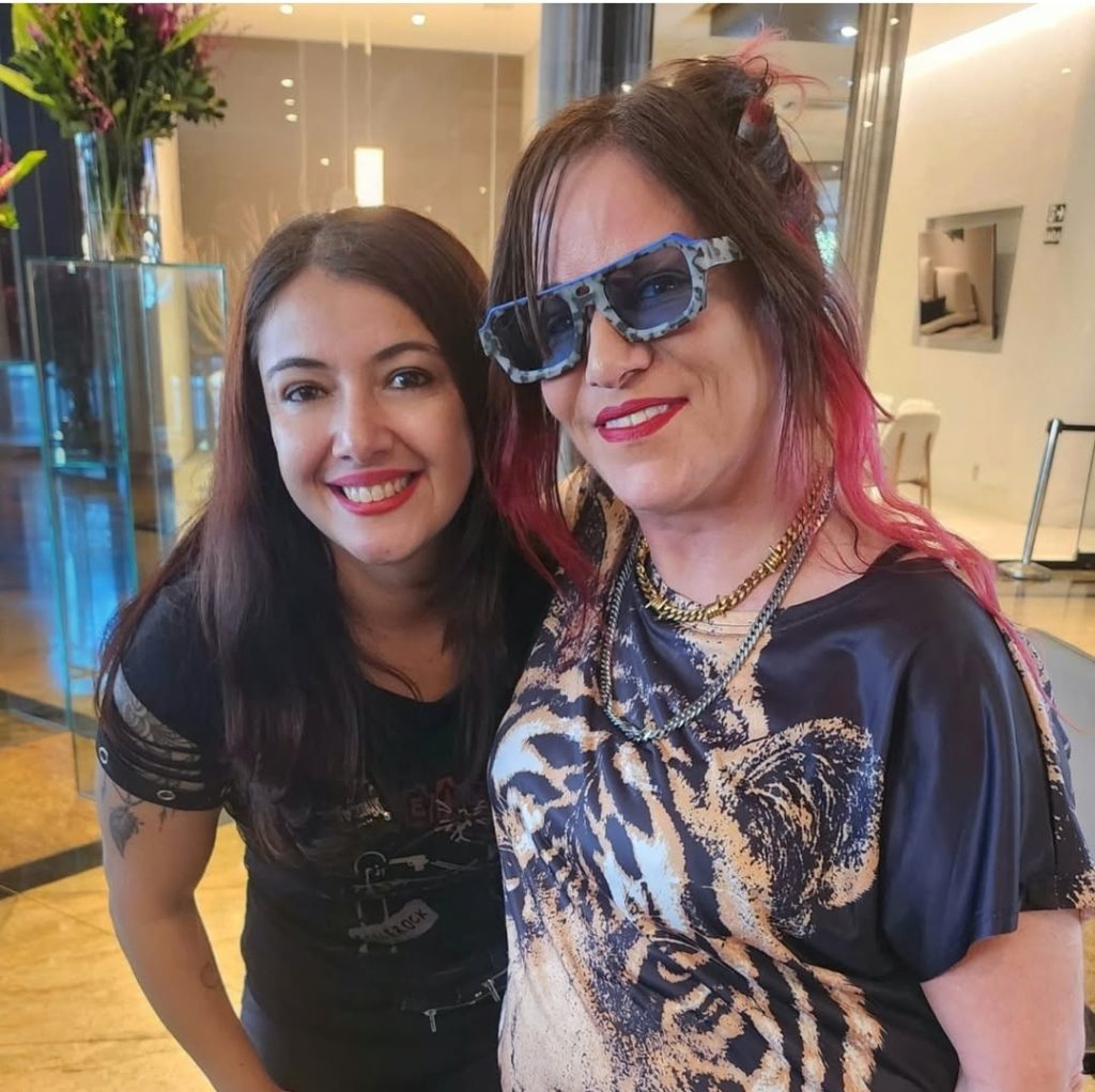 Jennifer Finch posing with a fan in Brazil 2025.