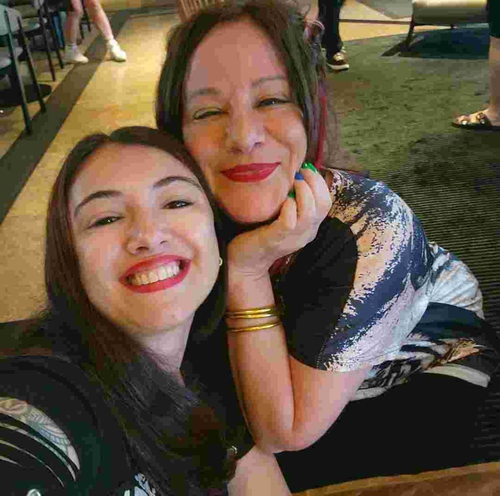 Jennifer Finch posing with a fan in Brazil.