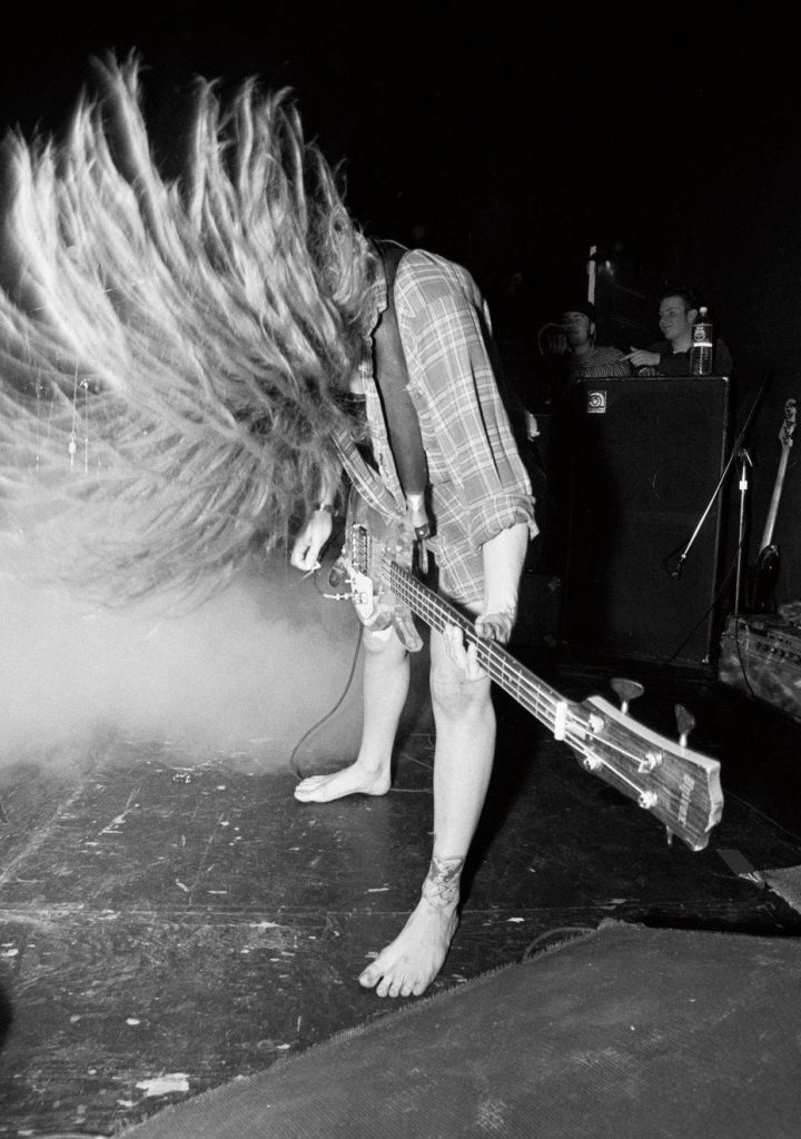 Jennifer Finch of L7 performing live in Washington DC. Photography by Pat Graham.