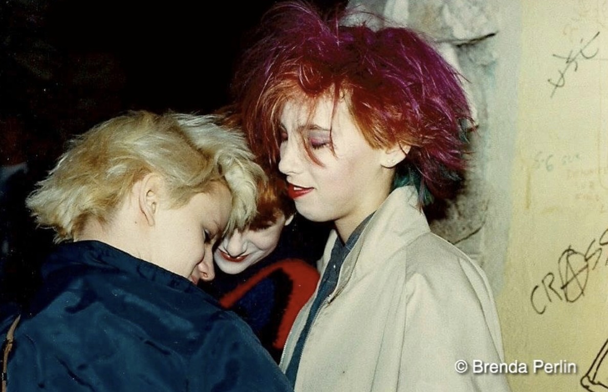 Jennifer Finch, Maggie Guerwitz, and Yasmine Spira standing outside
